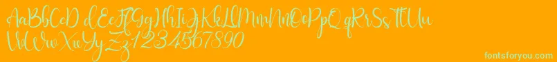 Fabulous-Schriftart – Grüne Schriften auf orangefarbenem Hintergrund