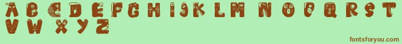 Facelook Font – Brown Fonts on Green Background