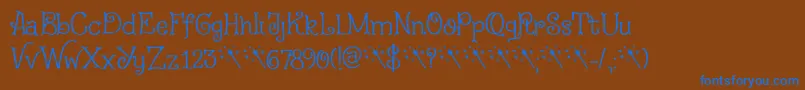 Czcionka Fairy Godmother DEMO – niebieskie czcionki na brązowym tle