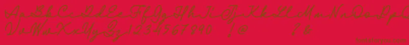 Fonte Fairyland Demo Font – fontes marrons em um fundo vermelho