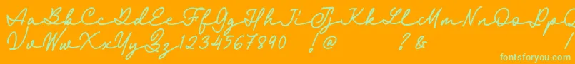 Fairyland Demo Font-Schriftart – Grüne Schriften auf orangefarbenem Hintergrund