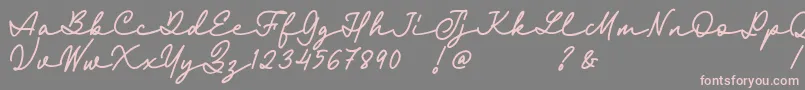 Fairyland Demo Font-Schriftart – Rosa Schriften auf grauem Hintergrund