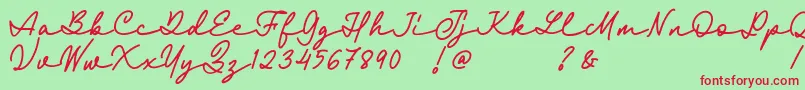 Fairyland Demo Font-Schriftart – Rote Schriften auf grünem Hintergrund