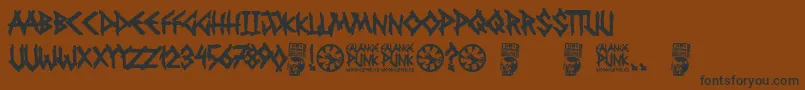 Fonte Falange Punk – fontes pretas em um fundo marrom