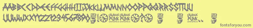 Fonte Falange Punk – fontes cinzas em um fundo amarelo