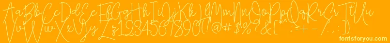 Falling Slowly Free Demo Font – Yellow Fonts on Orange Background