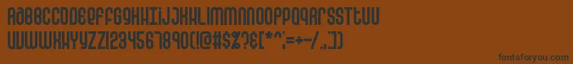 フォントfalsepos – 黒い文字が茶色の背景にあります