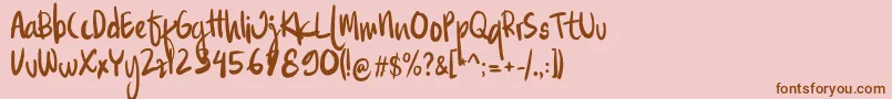 Familite Font – Brown Fonts on Pink Background
