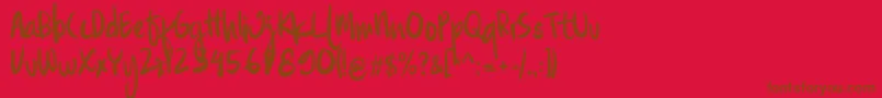 Familite Font – Brown Fonts on Red Background