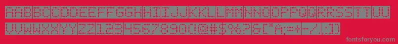 Fonte fanfaretickerbackground – fontes cinzas em um fundo vermelho