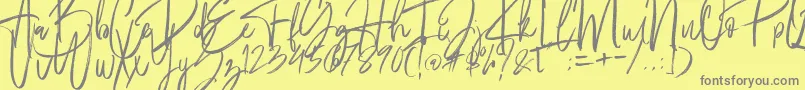 Fantastico-Schriftart – Graue Schriften auf gelbem Hintergrund