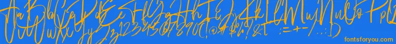 フォントFantastico – オレンジ色の文字が青い背景にあります。