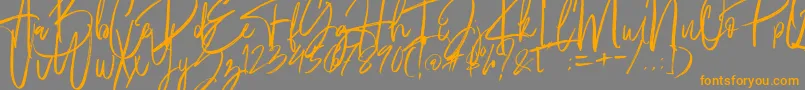 Fantastico-Schriftart – Orangefarbene Schriften auf grauem Hintergrund