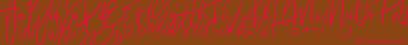 Fantastico-Schriftart – Rote Schriften auf braunem Hintergrund