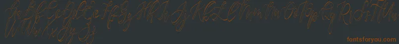Шрифт Fantasy Hollow   – коричневые шрифты на чёрном фоне