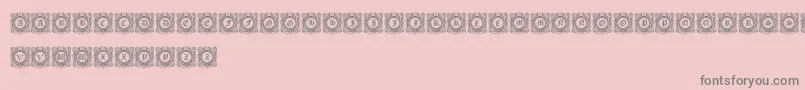 フォントFantasyCapitals – ピンクの背景に灰色の文字