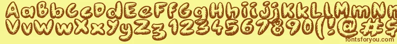 Fanzine Title Font – Brown Fonts on Yellow Background