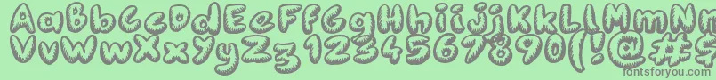 Fanzine Title Font – Gray Fonts on Green Background