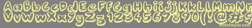 Fanzine Title Font – Yellow Fonts on Gray Background