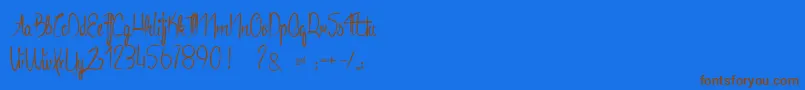 AnacondasLight-Schriftart – Braune Schriften auf blauem Hintergrund