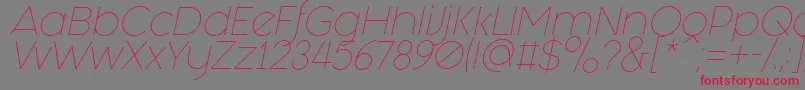 Fashion Fetish Light Italic-fontti – punaiset fontit harmaalla taustalla