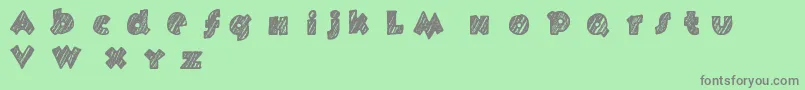 Fast Foont-Schriftart – Graue Schriften auf grünem Hintergrund