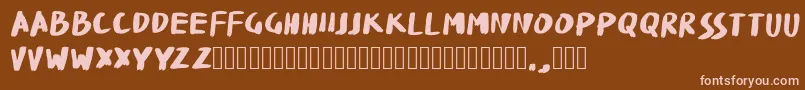 フォントFatBrushWK – 茶色の背景にピンクのフォント