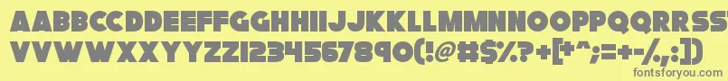 フォントFatCat – 黄色の背景に灰色の文字
