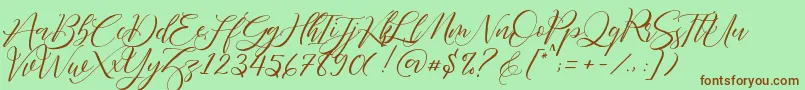 Fonte Fathir Script Personal Use – fontes marrons em um fundo verde