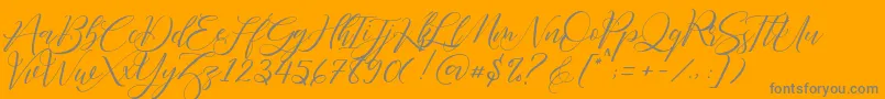 Fathir Script Personal Use-Schriftart – Graue Schriften auf orangefarbenem Hintergrund