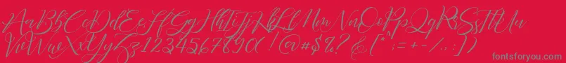 Fonte Fathir Script Personal Use – fontes cinzas em um fundo vermelho