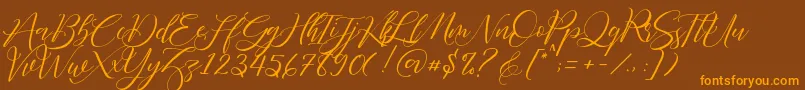 Fathir Script Personal Use-Schriftart – Orangefarbene Schriften auf braunem Hintergrund