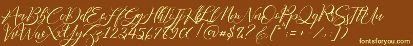 フォントFathir Script Personal Use – 黄色のフォント、茶色の背景