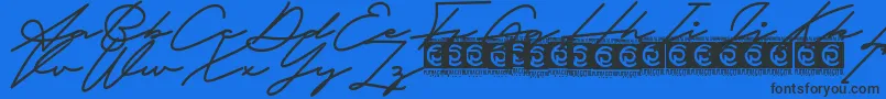 Fathur Free Font – Black Fonts on Blue Background