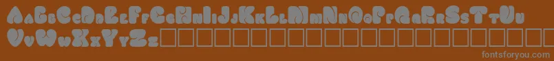 Шрифт FATSOCAP – серые шрифты на коричневом фоне