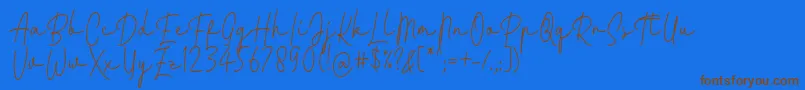 フォントFattana Regular Font by 7NTypes – 茶色の文字が青い背景にあります。