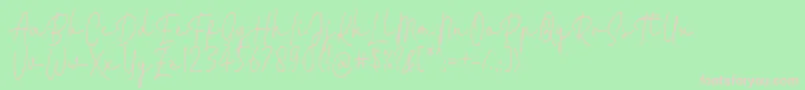 Fattana Regular Font by 7NTypes-fontti – vaaleanpunaiset fontit vihreällä taustalla