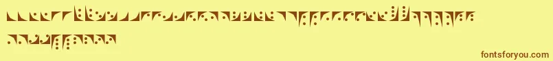 フォントNox – 茶色の文字が黄色の背景にあります。