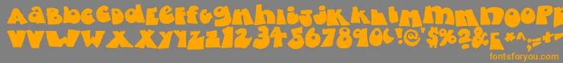 fatty bombatty-Schriftart – Orangefarbene Schriften auf grauem Hintergrund