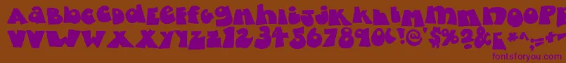 fatty bombatty Font – Purple Fonts on Brown Background