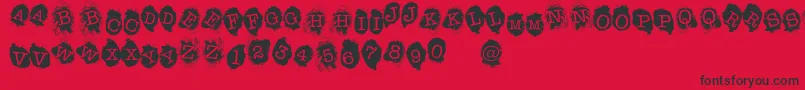 フォントFE Fingerprints Inside – 赤い背景に黒い文字