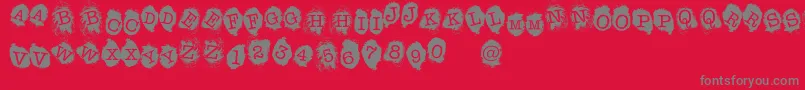 フォントFE Fingerprints Inside – 赤い背景に灰色の文字