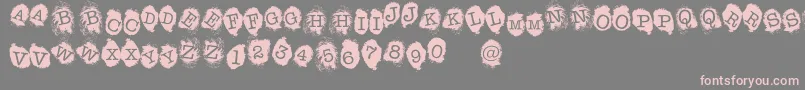 フォントFE Fingerprints Inside – 灰色の背景にピンクのフォント
