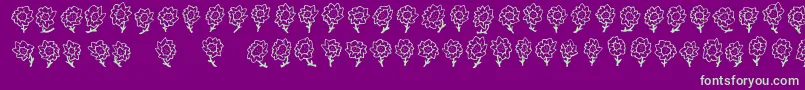 FE Majas Flowers Font – Green Fonts on Purple Background