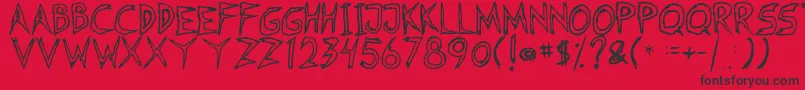 Czcionka Fearless Coyne Hollow – czarne czcionki na czerwonym tle