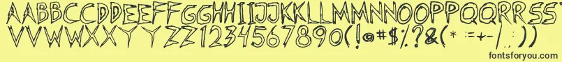 Fearless Coyne Hollow Font – Black Fonts on Yellow Background