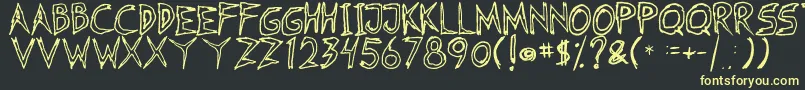 Fearless Coyne Hollow Font – Yellow Fonts on Black Background