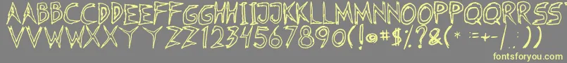 Fearless Coyne Hollow Font – Yellow Fonts on Gray Background