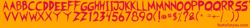 フォントFearless Coyne Shadow – オレンジの背景に赤い文字