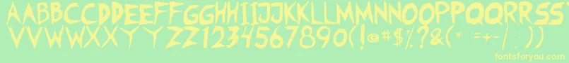 フォントFearless Coyne Shadow – 黄色の文字が緑の背景にあります